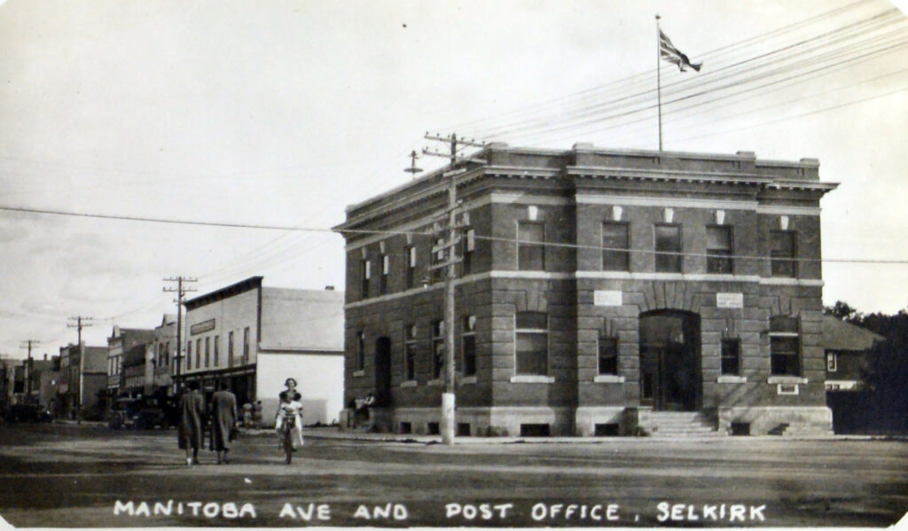 Black and white image of the Old Post Office from across Main Street