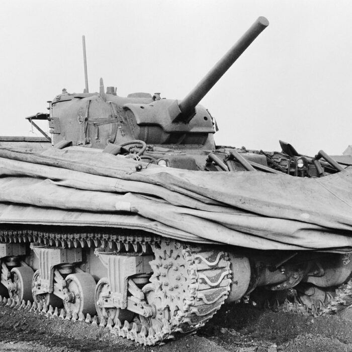 Sherman Duplex Drive Amphibious Tank with Waterproof Float Screens, c1944, Imperial War Museum, Collection No. 5207-04 A black and white image of a Sherman Duplex Drive Tank
