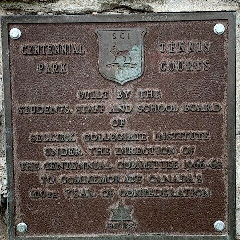 Close up of the Cairn Infront of École Selkirk Junior Highschool, 2024, Selkirk Museum Collection Colour image of a metal plaque on a cairn