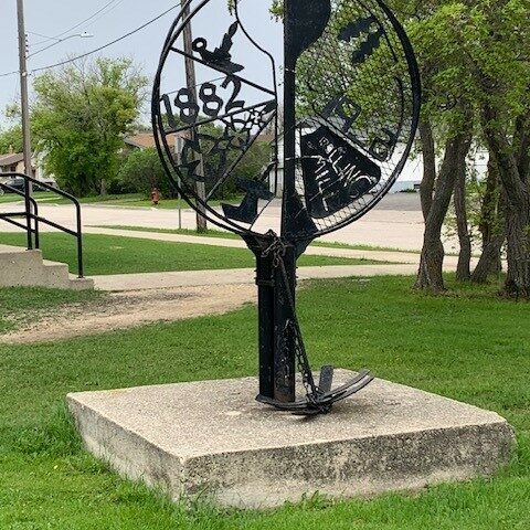 Selkirk’s Centennial Sculpture, 2024, Selkirk Museum Collection A colour image of a metal monument describing Selkirk's history