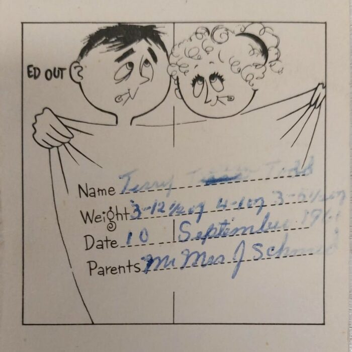 Birth Card for Triplets Delivered, 1961, Karen Still Black and white photo of a birth card with a man and a woman standing behind a sheet. The babies' information is detailed on the card such as weight, length, names, and parents names