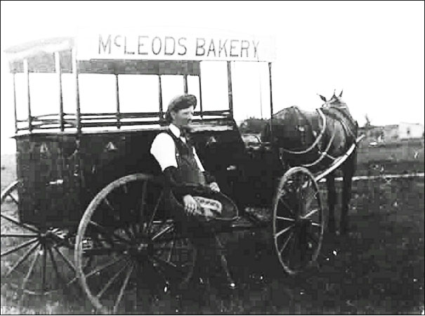 Black and white photo of McLeod's Bakery delivery wagon and horse