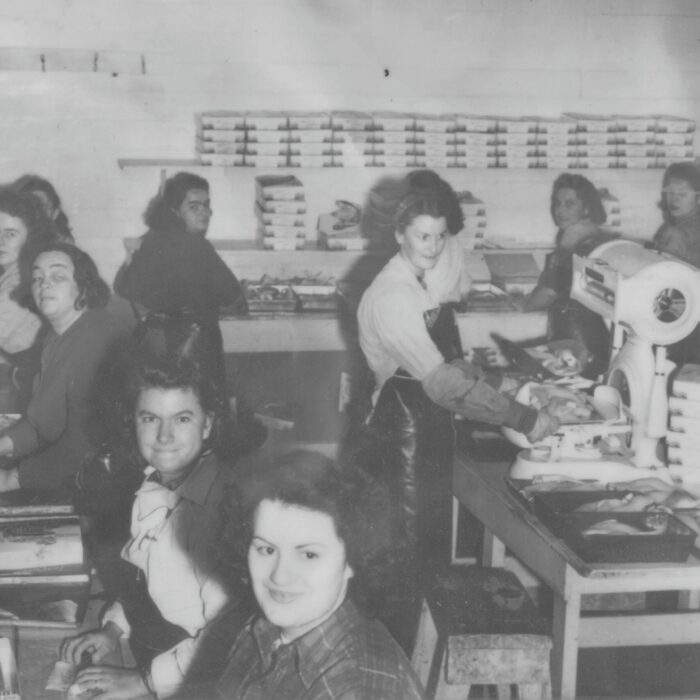Group photo of Booth Fisheries Workers, 1934-1935, Booth Fisheries Black and white photo of a group of women working at booth fisheries