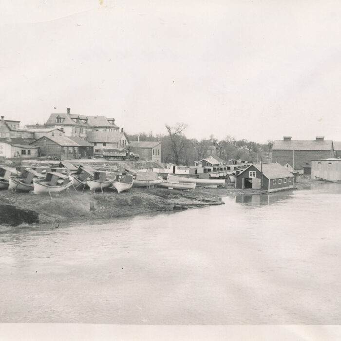 Selkirk Dock, Ice Houses, and Booth Fisheries on the Far Right, Date Unknown, Jonine Adderson Black and white photo of Selkirk Dock, ice houses, and Booth Fisheries along the river