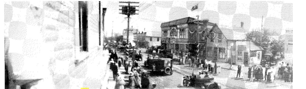 Black and white photo of a street view with Pearson's Hall on the right